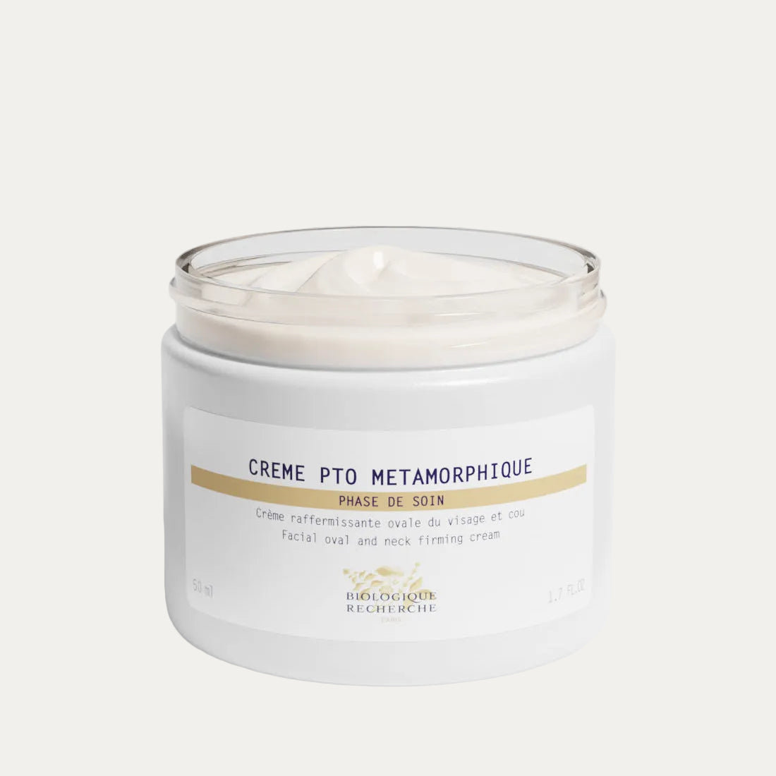 White opened cream jar labeled 'Crème Métamorphique', firming and lifting face cream on a white background, Biologique Recherche Amsterdam