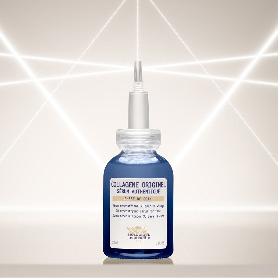 Bottle of 'Collagène Originel' serum with a pipette on a light ivory background 30ml