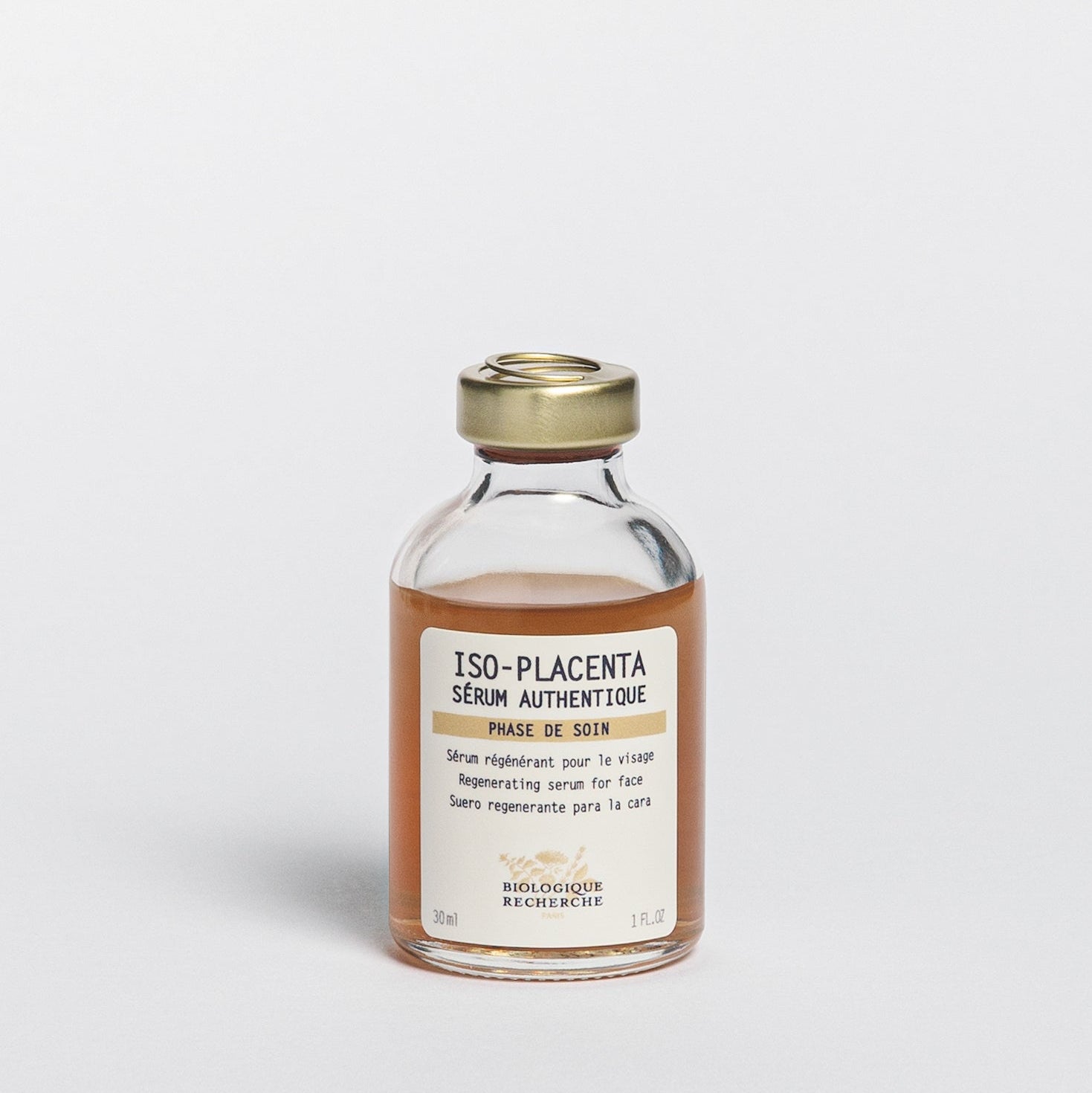Glass serum bottle 30ml labeled 'Iso-Placenta', skin healing and regenerative serum on a white background, BR at Oasis Amsterdam