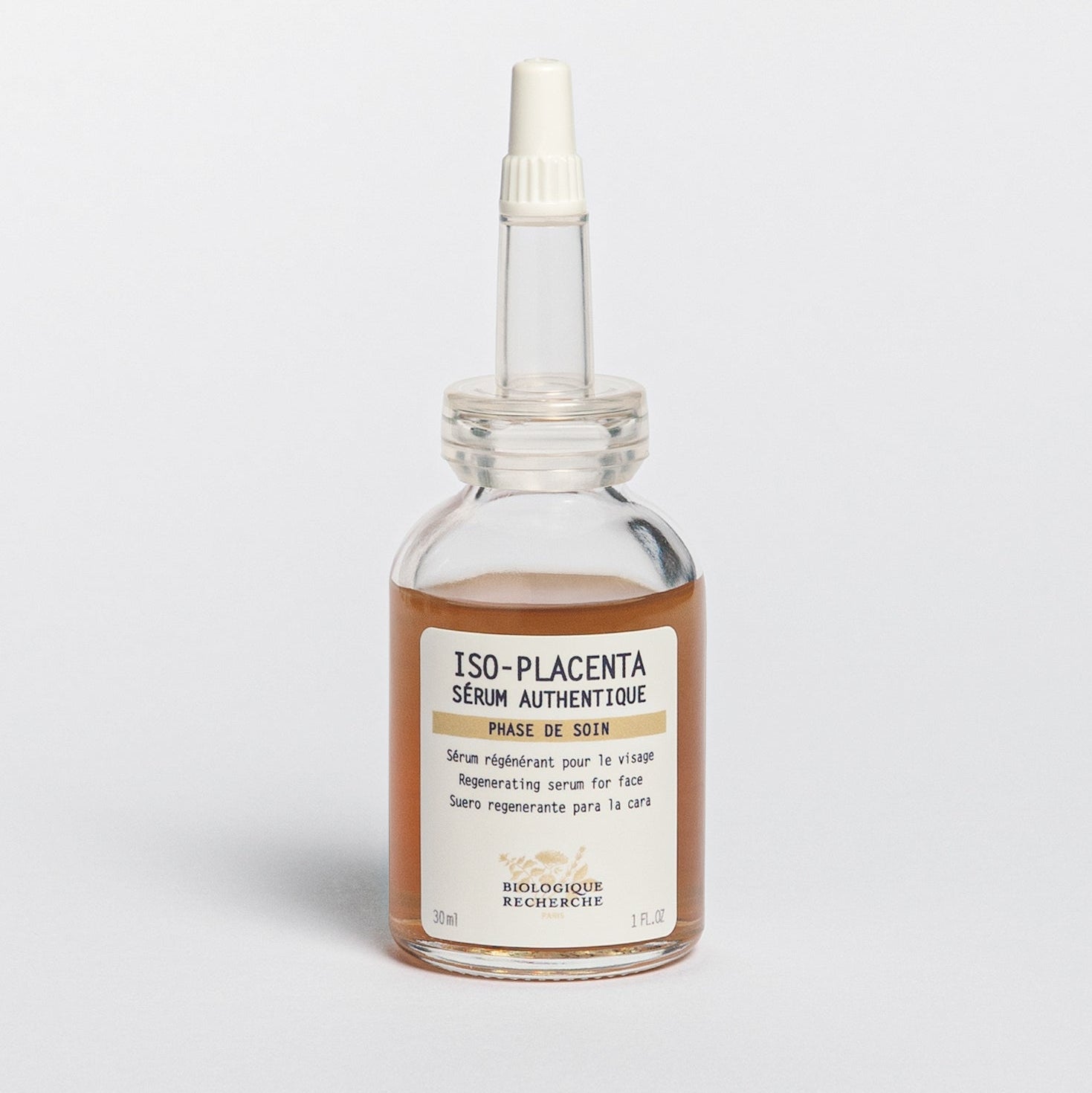 Glass serum bottle with dropper 30ml labeled 'Iso-Placenta', skin healing and regenerative serum on a white background, BR Amsterdam