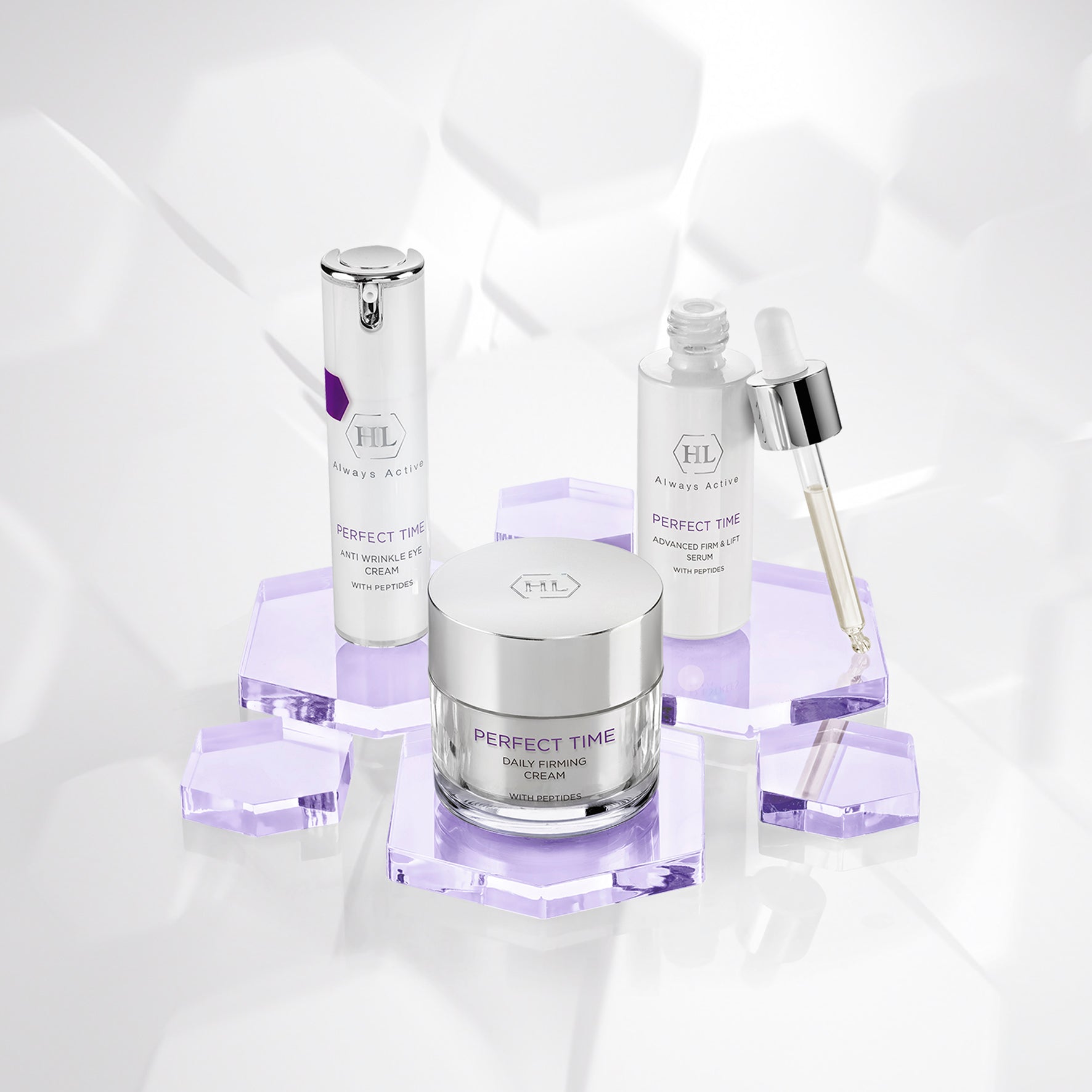 Skincare products including a jar, bottles, and dropper on a light gray background