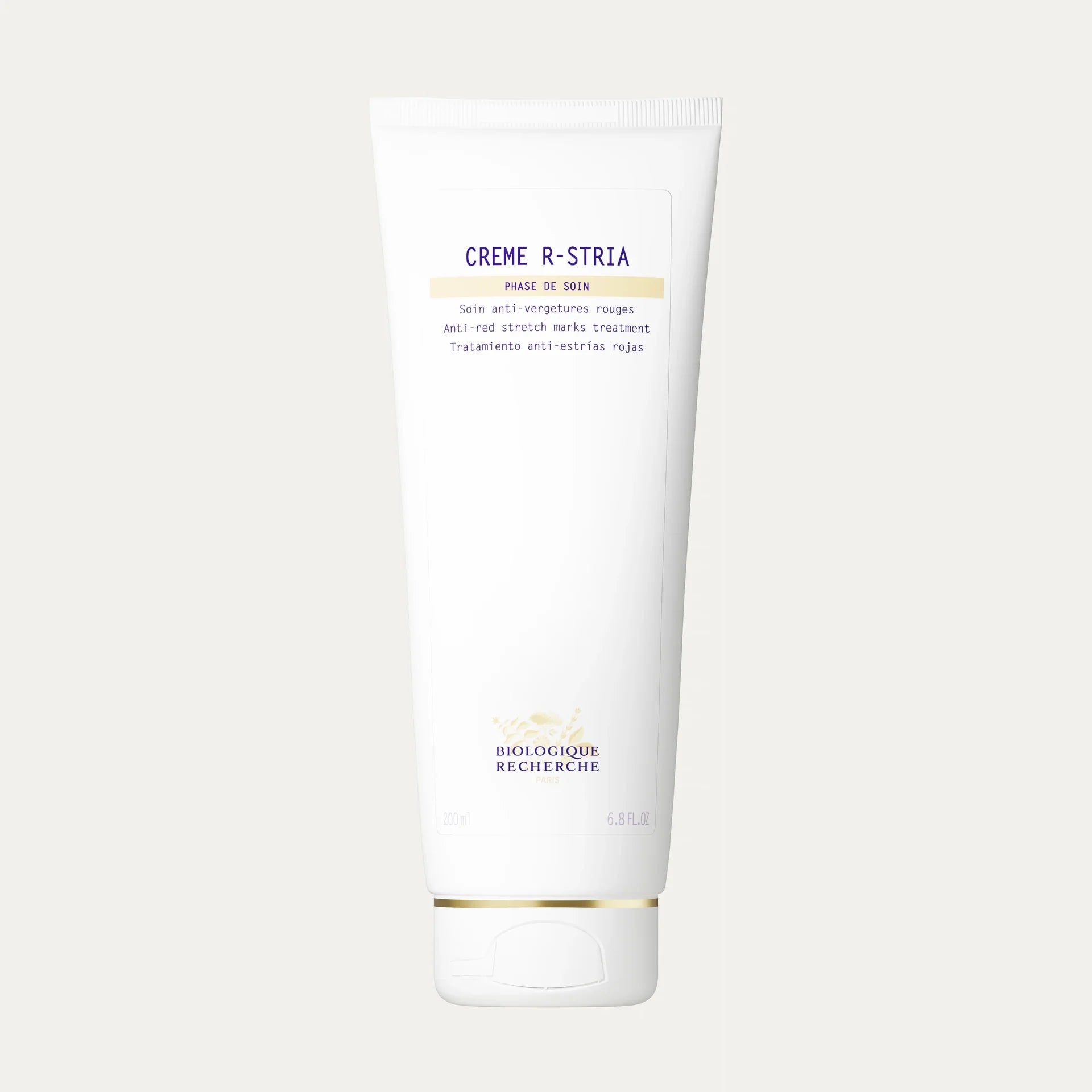 Crème R-Stria by Biologique Recherche is a targeted body cream designed to improve the appearance of stretch marks and restore skin elasticity. This advanced formula supports skin regeneration, helping to reduce the visibility of both new and existing stretch marks while improving skin texture and firmness.
