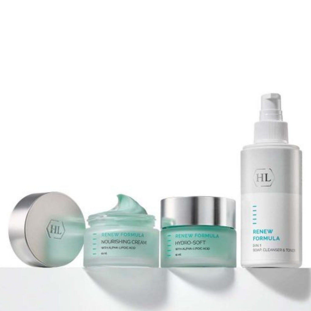 Skincare product set with jars and a spray bottle on a white background